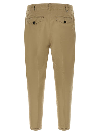 Trousers by PT Torino for men in linen & cotton beige features a sculptural silhouette, showcasing a sculptural and long with a sophisticated low rise for a sculptural finish.