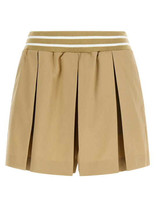 Cargo Shorts by Moschino for women in cotton beige features an utilitarian design, highlighting a utilitarian wide and short cut with a comfortable for a sophisticated, premium look.