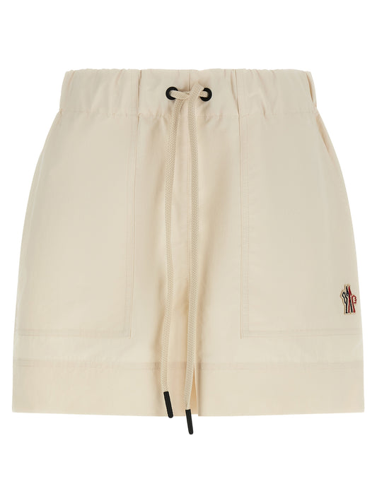 Bermuda Shorts by Moncler Grenoble for women in polyester white features an nuanced silhouette, showcasing a nuanced with a short cut and for a sophisticated, premium finish.