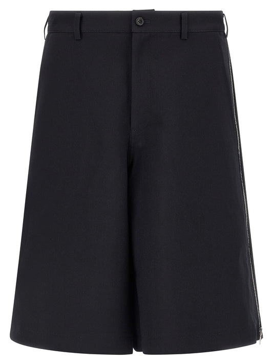 Bermuda Shorts by Comme Des Garçons for men in polyester blue & herringbone features a sartorial silhouette, showcasing a sartorial wide and short with a sophisticated for a sartorial look.