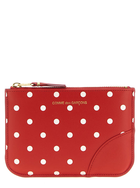 Cardholder Card Case by Comme Des Garçons for unisex in calfskin leather multicolor, red, dots & print features a distinguished silhouette, showcasing the distinguished design of the Calfskin Leather Cardholder Card Case with refined card-organization.