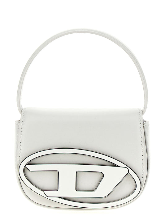 This Handbag by Diesel for women in leather & metal and white presents a sculptural silhouette featuring a secure magnetic, ample , and versatile handle for a sculptural finish.