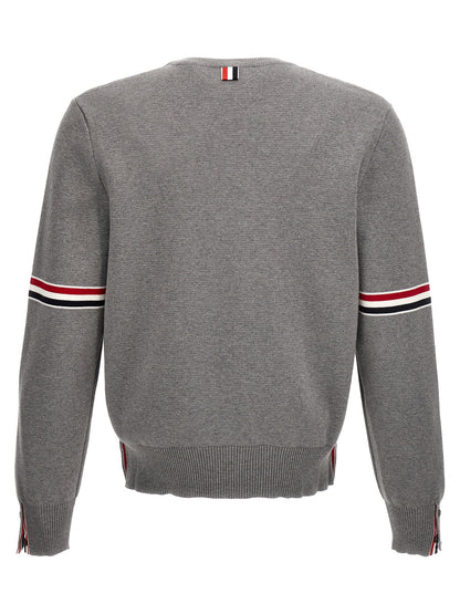 Cardigan by Thom Browne for men in cotton gray, patterned & signature presents a textural silhouette, artfully finished with a textural and for a sophisticated, textural look.