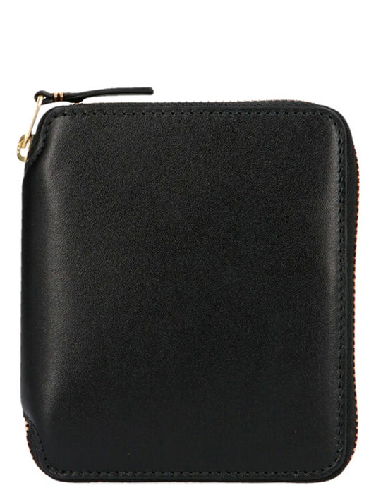 Wallet by Comme Des Garçons for men in bos taurus suede calfskin leather black showcases a discerning silhouette, artfully capturing the essence of Arecalf Bos Taurus Suede Calfskin Leather Wallet with its functional zip-around.