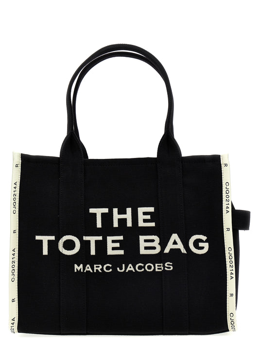 Shopper Tote Bag by Marc Jacobs for women in cotton polyester canvas bicolour, black, white & print features an metropolitan chic Cotton Polyester Canvas Shopper Tote Bag design with a secure zipper, metropolitan chic , and versatile handle for a metropolitan chic look.