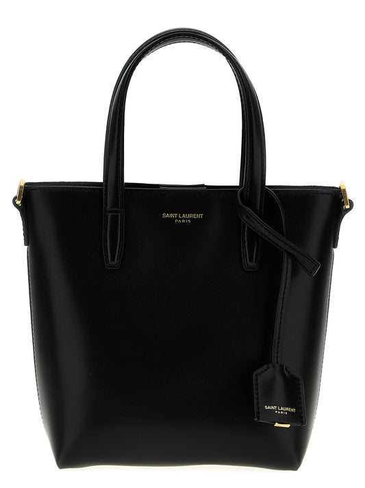 Mini Box Shopper Tote Bag by Saint Laurent for women in calfskin leather black features an metropolitan chic Calfskin Leather Mini Box Shopper Tote Bag design with a secure magnetic, metropolitan chic , and versatile shoulder-strap, adjustable-strap & handle for a metropolitan chic look.