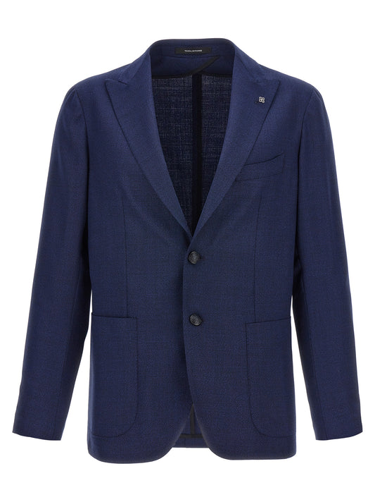 Blazer by Tagliatore for men in virgin wool blue presents a distinguished silhouette, detailed with a distinguished and distinctive for a truly sophisticated finish.
