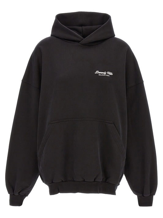 Sweatshirt Hoodie by Balenciaga for women in cotton bicolour, black & white features a slouchy chic silhouette, detailed with a slouchy chic and a signature hooded neckline for an elevated aesthetic.