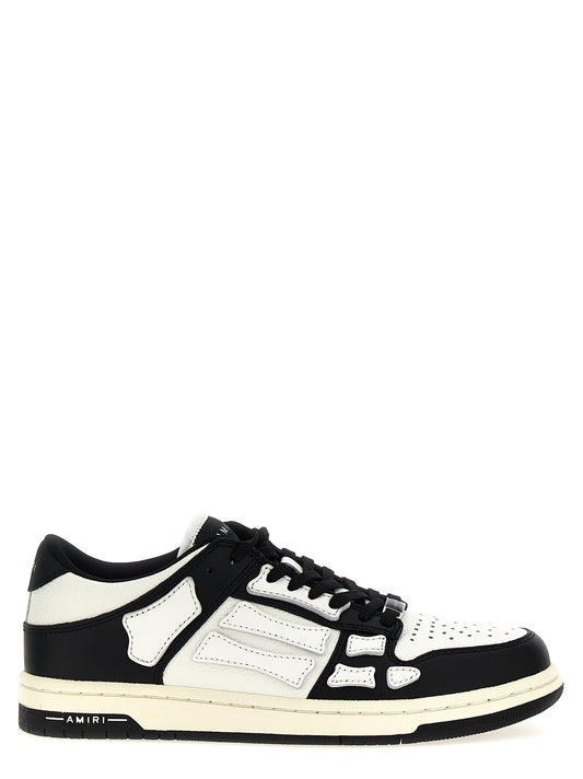 Sneakers by Amiri for women in leather & rubber bicolour, black & white presents a on trend silhouette from the Women's Low Top Leather & Rubber Sneakers collection, showcasing a on trend low-top style for an elevated aesthetic.