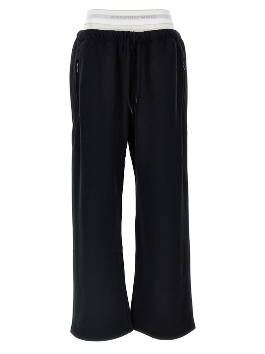 Joggers by T BY ALEXANDER WANG for women in cotton black presents a refined pantology silhouette, artfully defined by a refined pantology wide, long, and a sophisticated .