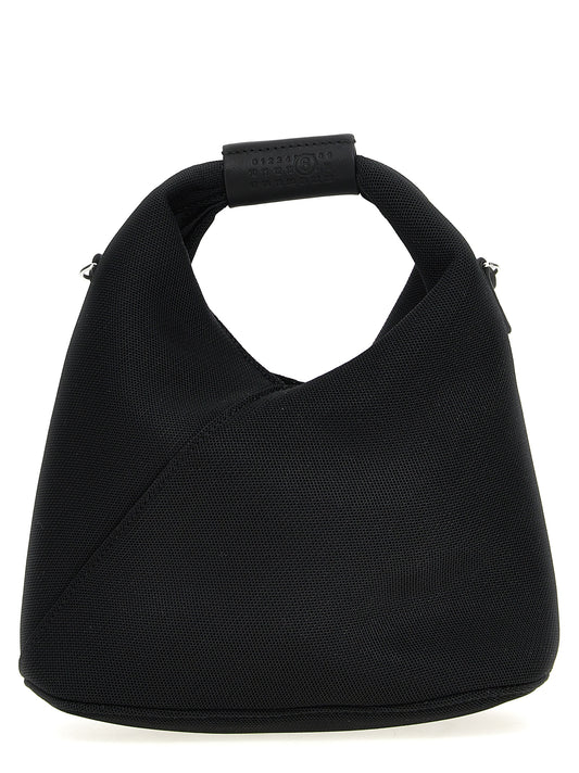 Crossbody Handbag by MM6 Maison Margiela for women in polyester polyurethane leather black showcases a versatile sophistication silhouette, featuring a secure , versatile sophistication , and versatile crossbody-strap, shoulder-strap, adjustable-strap & handle for a versatile sophistication finish.