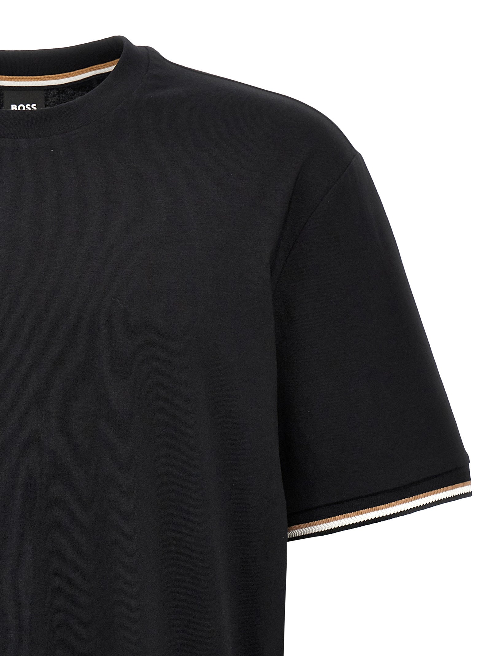 T-Shirt by Hugo Boss for men in cotton black features an edgy silhouette, meticulously detailed with a sophisticated and crew neckline for a truly edgy finish.