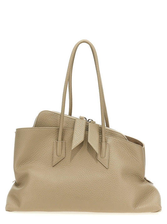 Medium Shoulder Bag by The Attico for women in calfskin leather beige & signature showcases a enviable silhouette, artfully detailed with a secure zipper, organized external-pockets, and versatile shoulder-strap & handle for a enviable look.