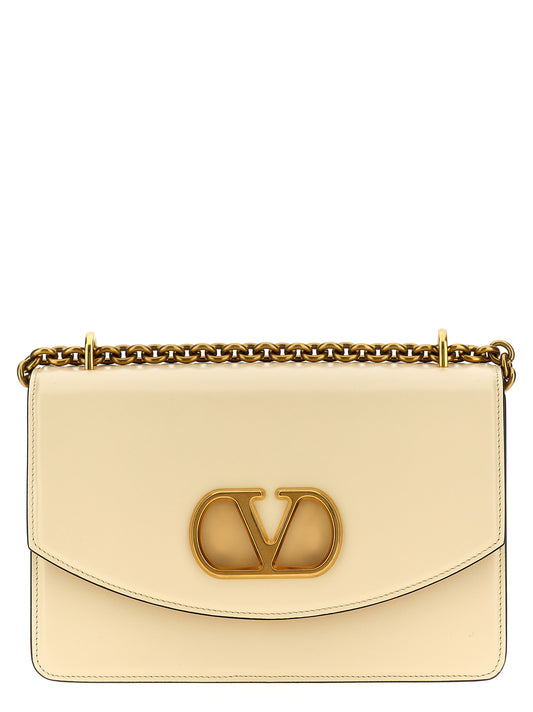 2-in-1 Shoulder & Crossbody Flap Bag by Valentino Garavani for women in bos taurus nappa & suede calf leather white & signature showcases a enviable silhouette, artfully detailed with a secure flap & magnetic, organized , and versatile crossbody-strap & shoulder-strap for a enviable look.