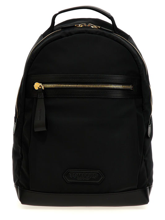 Travel Backpack by Tom Ford for men in calf leather black showcases an architectural Calf Leather Travel Backpack design, featuring a secure zipper, ample external-pockets, and architectural backpack-strap & adjustable-strap for a sophisticated look.