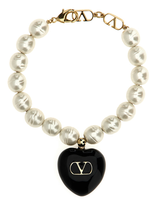 This Bracelet by Valentino Garavani for women in calfskin leather and black & signature showcases a exquisite silhouette, highlighting the intricate from the V Logo Women's Enamel Brass & Glass Bracelet collection for a exquisite aesthetic.