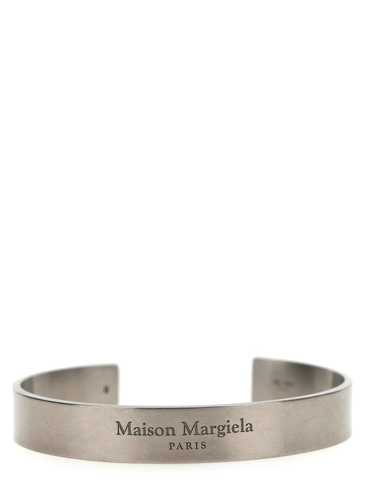 Bracelet by Maison Margiela for women in suede calfskin leather silver features a architectural silhouette, elegantly showcasing a architectural bangle bracelet design that defines the Women's Bangle Silver Bracelet aesthetic.