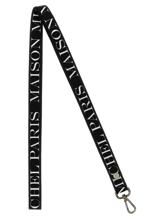 This Keychain by Maison Michel for women in denim cotton and bicolour, black & white showcases a couture-inspired aesthetic, meticulously highlighting the and with a finish.