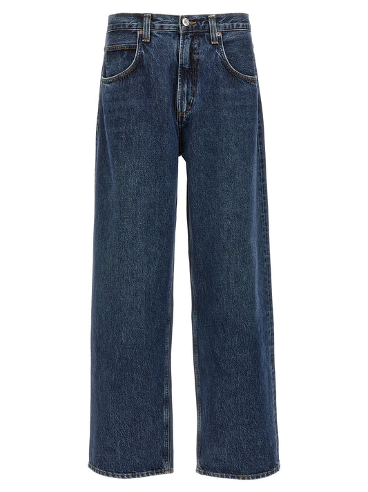 Jeans by Agolde for men in organic cotton denim blue features a polished silhouette with a polished wide, reaching a polished long and finished with a polished .