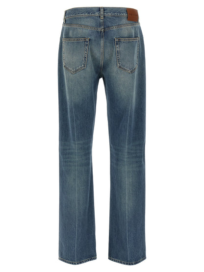 Jeans by Alexander McQueen for men in denim cotton blue presents a tailored silhouette, showcasing a tailored straight-leg and long cut with a refined for a truly tailored aesthetic.