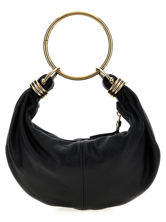Hobo Handbag by Chloé for women in calfskin leather black features an refined silhouette, showcasing a secure zipper, ample , and versatile shoulder-strap, adjustable-strap, detachable-strap & handle for a sophisticated refined aesthetic.