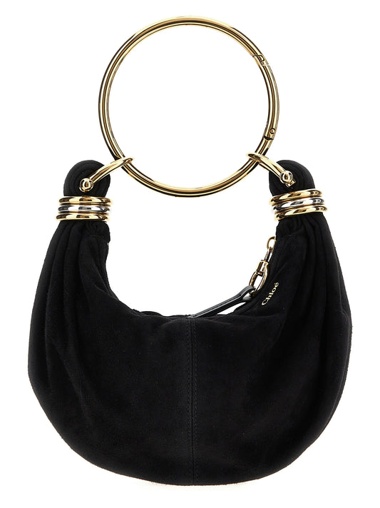 Mini Hobo Handbag by Chloé for women in plush viscose goat leather & fur black features a signature silhouette, showcasing a secure zipper and signature with versatile shoulder-strap, adjustable-strap & handle for a sophisticated look.