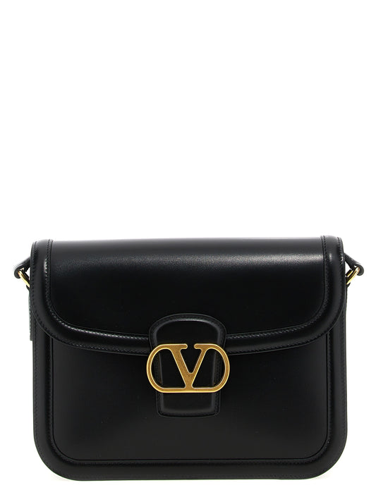 Shoulder Flap Bag by Valentino Garavani for men in bos taurus calf suede leather black & signature features an effortlessly chic silhouette with a secure flap, magnetic & buckle, ample , and versatile shoulder-strap & adjustable-strap for effortlessly chic everyday luxury.