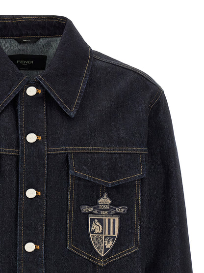 This Trucker Jacket by Fendi for men in denim cotton blue exhibits a edgy silhouette, meticulously detailed with functional pockets and a edgy shirt-collar neckline for a edgy finish.