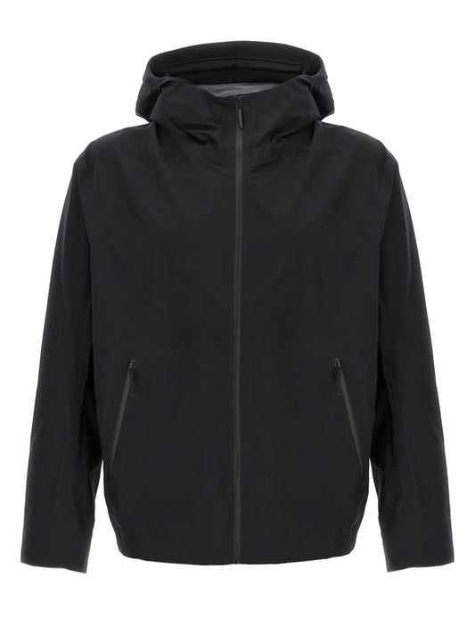 Hooded Windbreaker Jacket by Arc'teryx Veilance for men in nylon & silicone black showcases a urban chic silhouette, detailed with a urban chic hooded neckline and functional lightweight, pockets, hooded & windproof for a polished finish.
