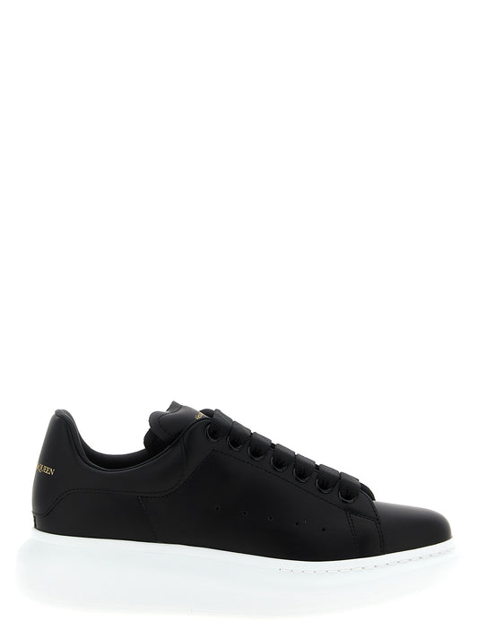 Sneakers by Alexander McQueen for women in bos taurus leather bicolour, black & white presents a on trend silhouette from the Women's Low Top Bos Taurus Leather Sneakers collection, showcasing a on trend low-top style for an elevated aesthetic.