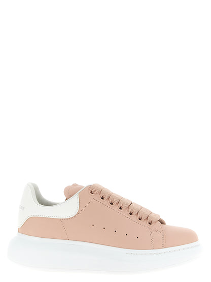 Sneakers by Alexander McQueen for women in calfskin leather multicolor & pink presents a sumptuous silhouette, artfully capturing the essence of the Women's Chunky Calfskin Leather Sneakers with its sumptuous chunky style design.