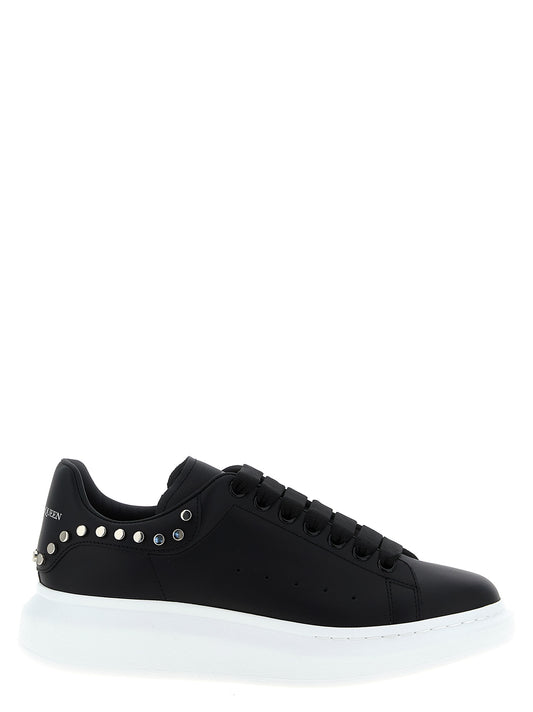 Sneakers by Alexander McQueen for men in calfskin leather black features an timeless silhouette from the Men's Chunky Calfskin Leather Sneakers collection, showcasing a signature chunky style with an timeless finish.