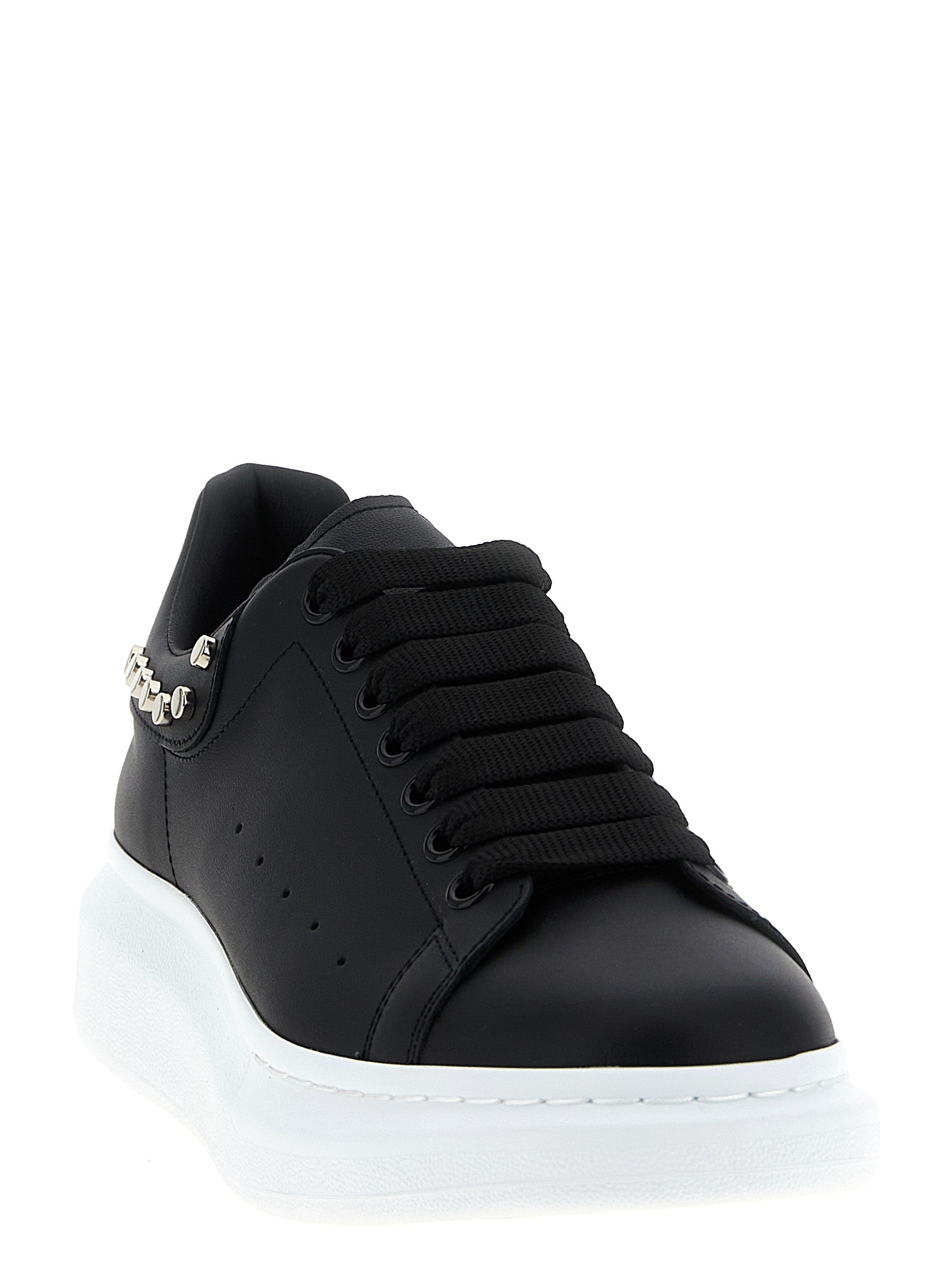 Sneakers by Alexander McQueen for men in calfskin leather black features an fashionable silhouette, showcasing the premium Men's Chunky Calfskin Leather Sneakers in a fashionable chunky style that offers a fashionable finish for refined style.