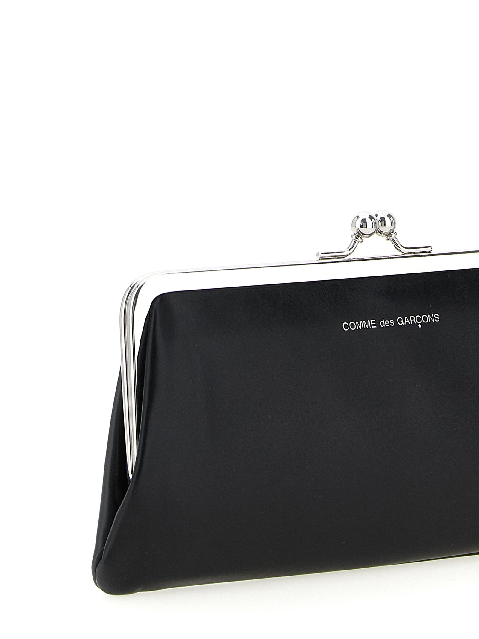 Wallet by Comme Des Garçons for men in leather black features a sleek silhouette, showcasing the sleek Leather Wallet design with sophisticated compact-design coin-purse for a premium look.
