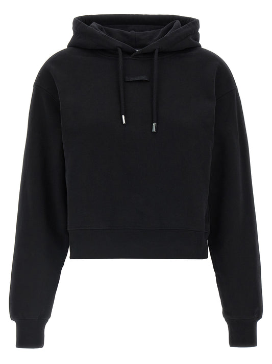 Sweatshirt Hoodie by Jacquemus for women in cotton black features an avant-garde silhouette, showcasing a sophisticated hooded neckline and long-sleeve detail for a truly avant-garde finish.