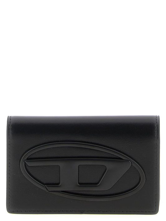 Cardholder Card Case by Diesel for men in leather & metal black features a distinguished silhouette, showcasing the distinguished design of the Holi D Leather & Metal Cardholder Card Case with refined card-organization.