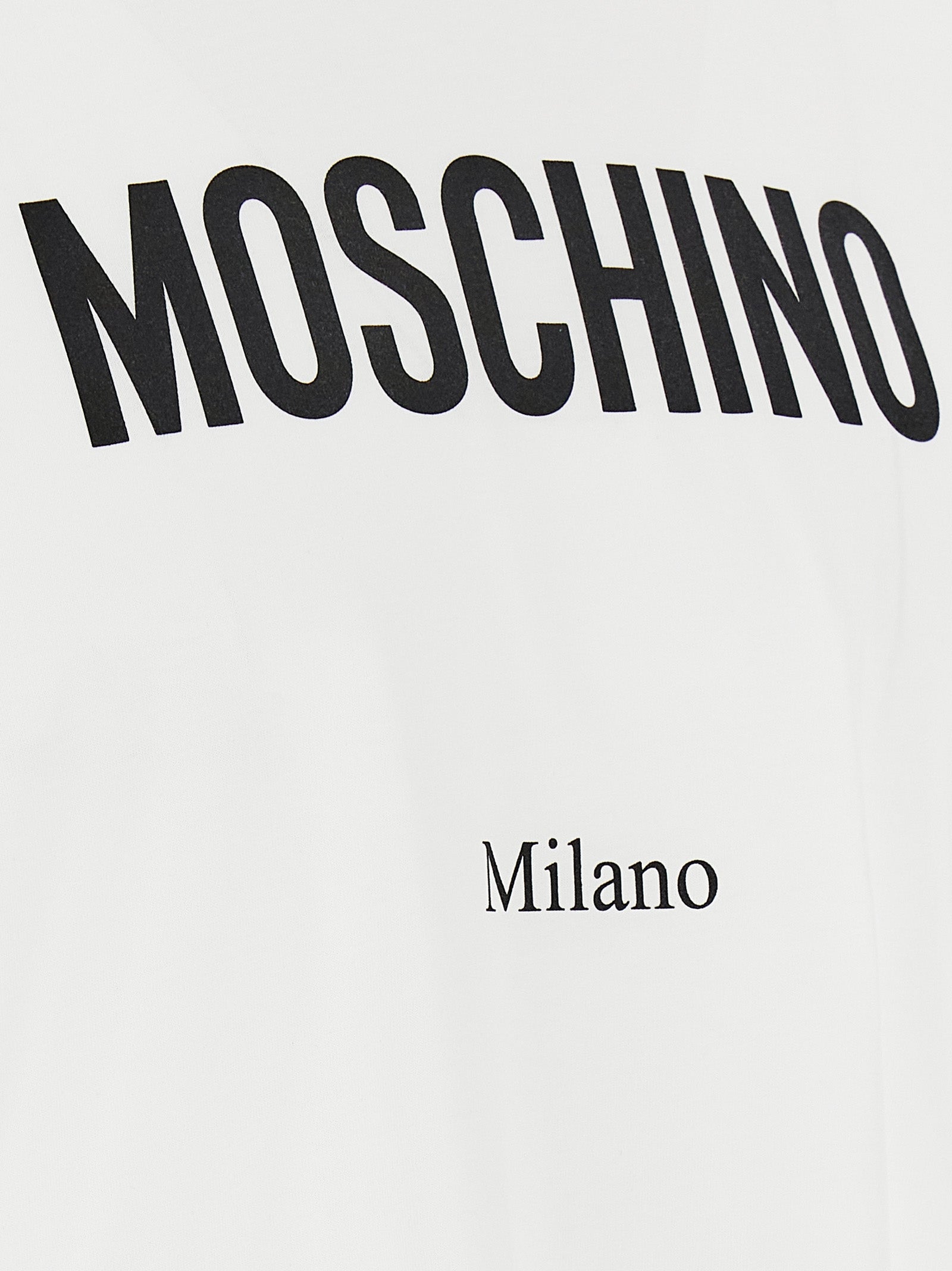 T-Shirt by Moschino for men in cotton bicolour, black, white & print showcases a fashionable silhouette, elegantly detailed with a fashionable and for a sophisticated, high-fashion look.