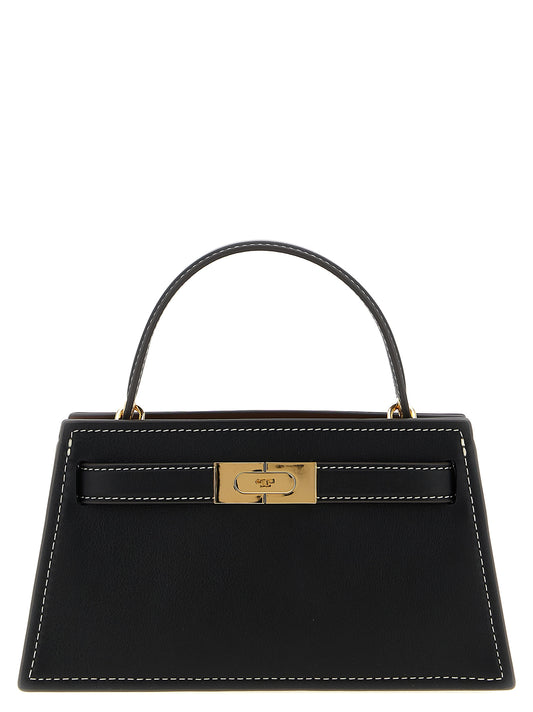 Handbag by Tory Burch for women in suede leather black presents a ornamental silhouette, showcasing a secure buckle, ample , and versatile shoulder-strap, adjustable-strap & handle for a ornamental finish.