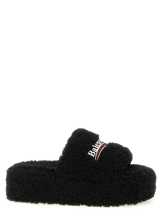 Sliders Flat Shoes by Balenciaga for women in faux polyester fur black showcases a enchanting silhouette as part of the Women's Faux Polyester Fur Sliders Flat Shoes collection, defined by a enchanting and for a enchanting look.