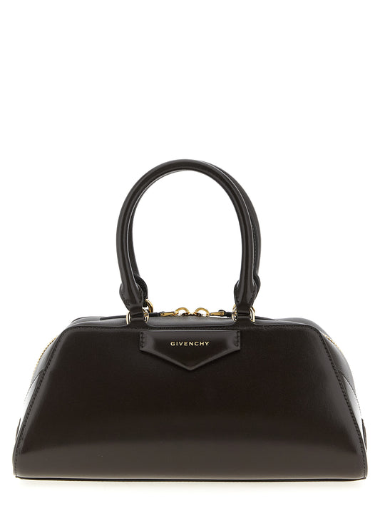 East West Handbag by Givenchy for women in calfskin leather brown features a exquisite silhouette, showcasing a secure and exquisite with versatile shoulder-strap, adjustable-strap & handle for a exquisite finish.