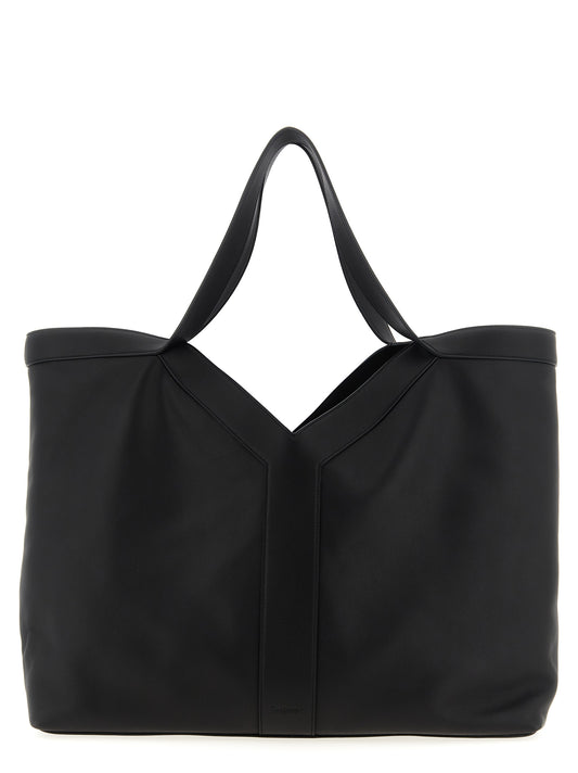 Large Shopper Tote Bag by Saint Laurent for men in suede calfskin leather black features a distinguished Suede Calfskin Leather Large Shopper Tote Bag design, complete with a secure snap & hook, ample , and versatile handle for a distinguished look.