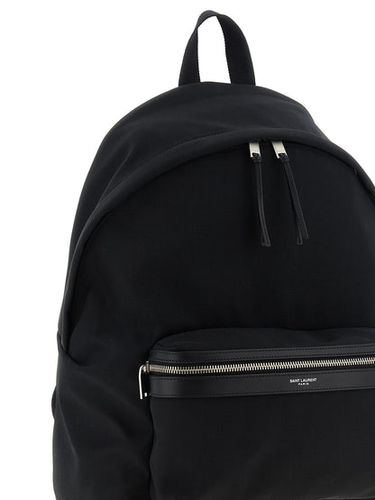 Backpack by Saint Laurent for men in polyamide patent leather black showcases an architectural Polyamide Patent Leather Backpack design, featuring a secure zipper, ample , and architectural handle, backpack-strap & adjustable-strap for a sophisticated look.