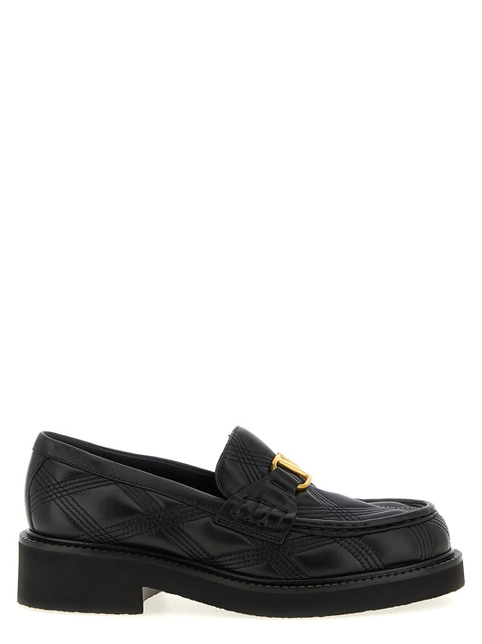 Flat Loafer Slip-On Shoes by Valentino Garavani for women in lamb leather black & signature features an dynamic silhouette from the V Logo Women's Lamb Leather Flat Loafer Slip-On Shoes collection, defined by a dynamic and flat for a dynamic look.