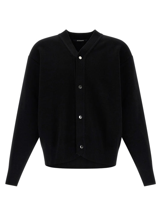 Cardigan by Jacquemus for men in polyamide & merino wool black presents a textural silhouette, artfully finished with a textural v-neck neckline and long-sleeve for a sophisticated, textural look.