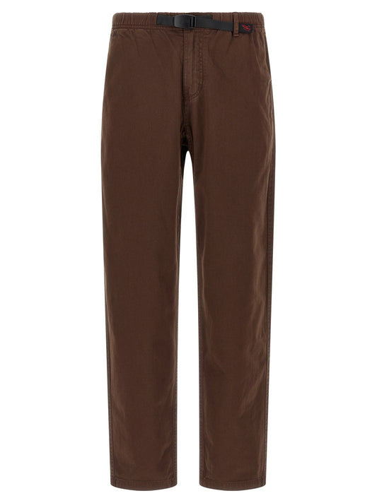 Trousers by Gramicci for men in organic cotton twill brown presents a smart silhouette, meticulously detailed with a smart wide, a smart long, and a smart .