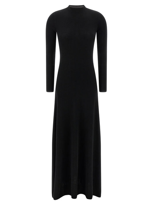 Dress by Tom Ford for women in silk polyamide & cashmere black features an sultry silhouette defined by a crew neckline and long-sleeve, falling to an sultry midi long for a sultry look.