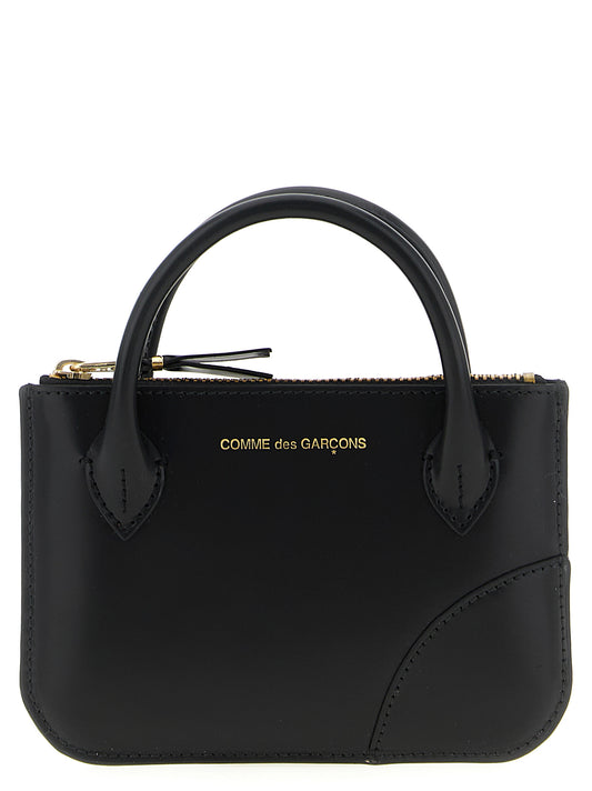 Cardholder Card Case by Comme Des Garçons for unisex in bos taurus calf suede leather black features an dynamic silhouette from the Bos Taurus Calf Suede Leather Cardholder Card Case collection, highlighting dynamic card-organization compact-design coin-purse for a premium and sophisticated look.