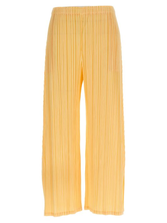 Casual Pants by PLEATS PLEASE ISSEY MIYAKE for women in polyester bicolour & yellow features a refined silhouette with a refined wide, defined by a and a refined long for a refined finish.