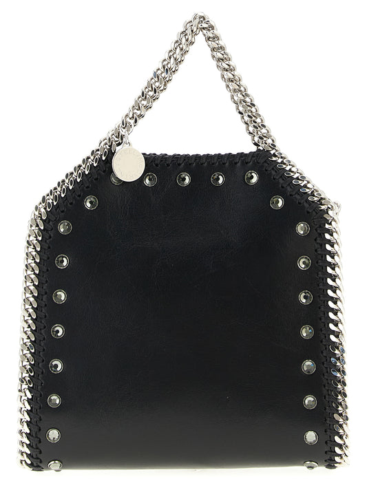 Handbag by Stella McCartney for women in exotic leather & crystal black features a exquisite silhouette, showcasing a secure magnetic and exquisite with versatile shoulder-strap & handle for a exquisite finish.