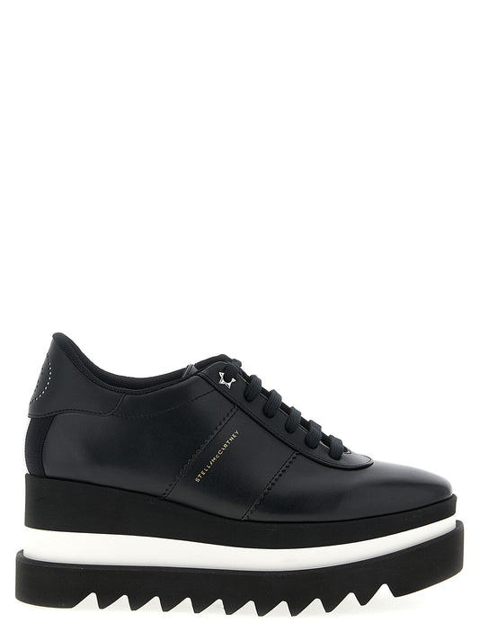 Wedge Lace-Up Sandals by Stella McCartney for women in polyethylene polyurethane leather black presents a sculptural silhouette, showcasing the Women's Polyethylene Polyurethane Leather Wedge Lace-Up Sandals design with a sculptural wedge and square toe style for a premium look.